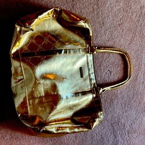 Slightly worn gold bag